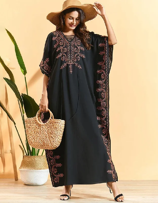 Embrace Bohemian Breezes: Embroidered Batwing Abaya with Flowing Pleated Skirt